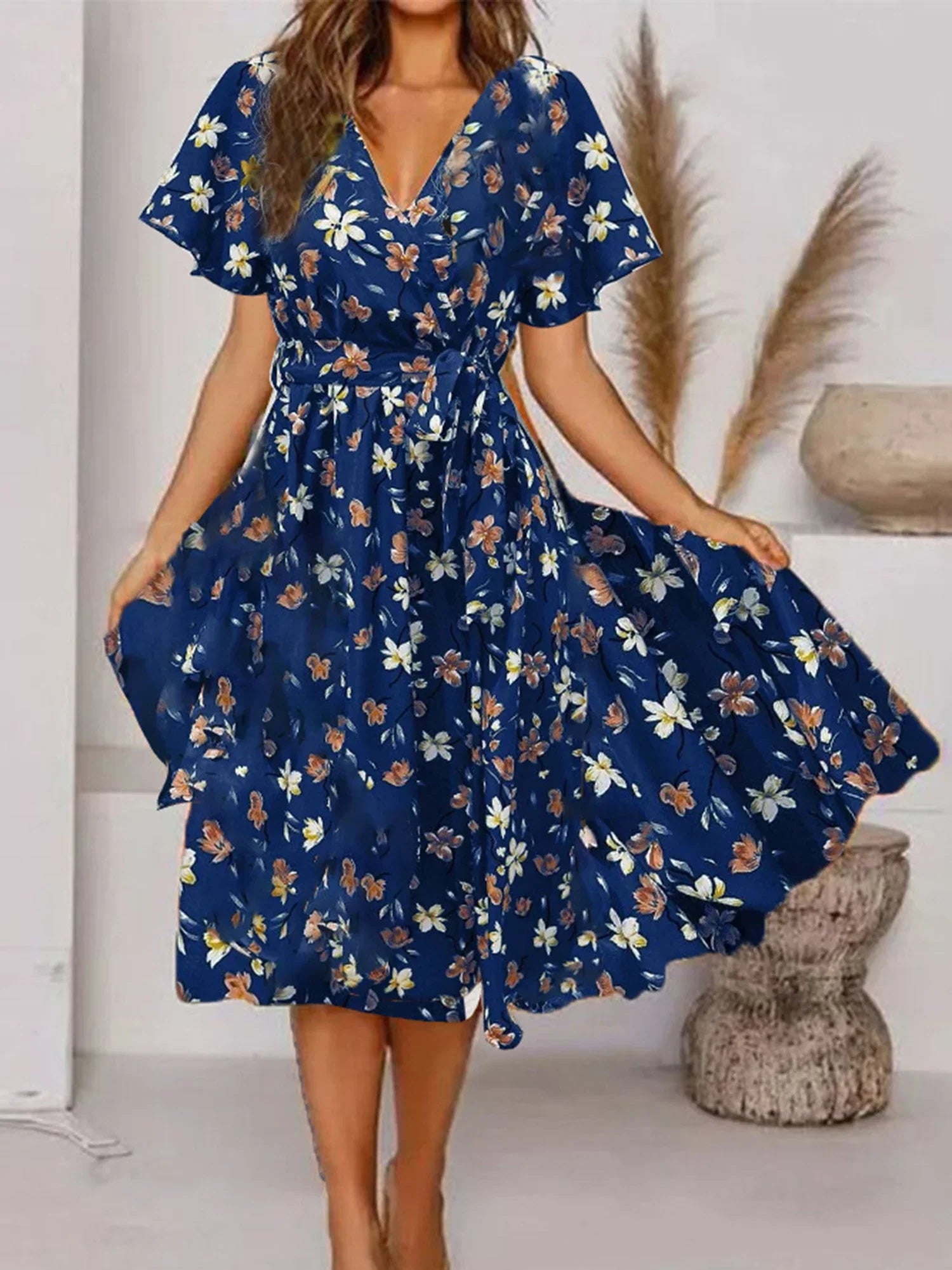 Evy | Rochie midi elegantă cu imprimeu floral rafinat