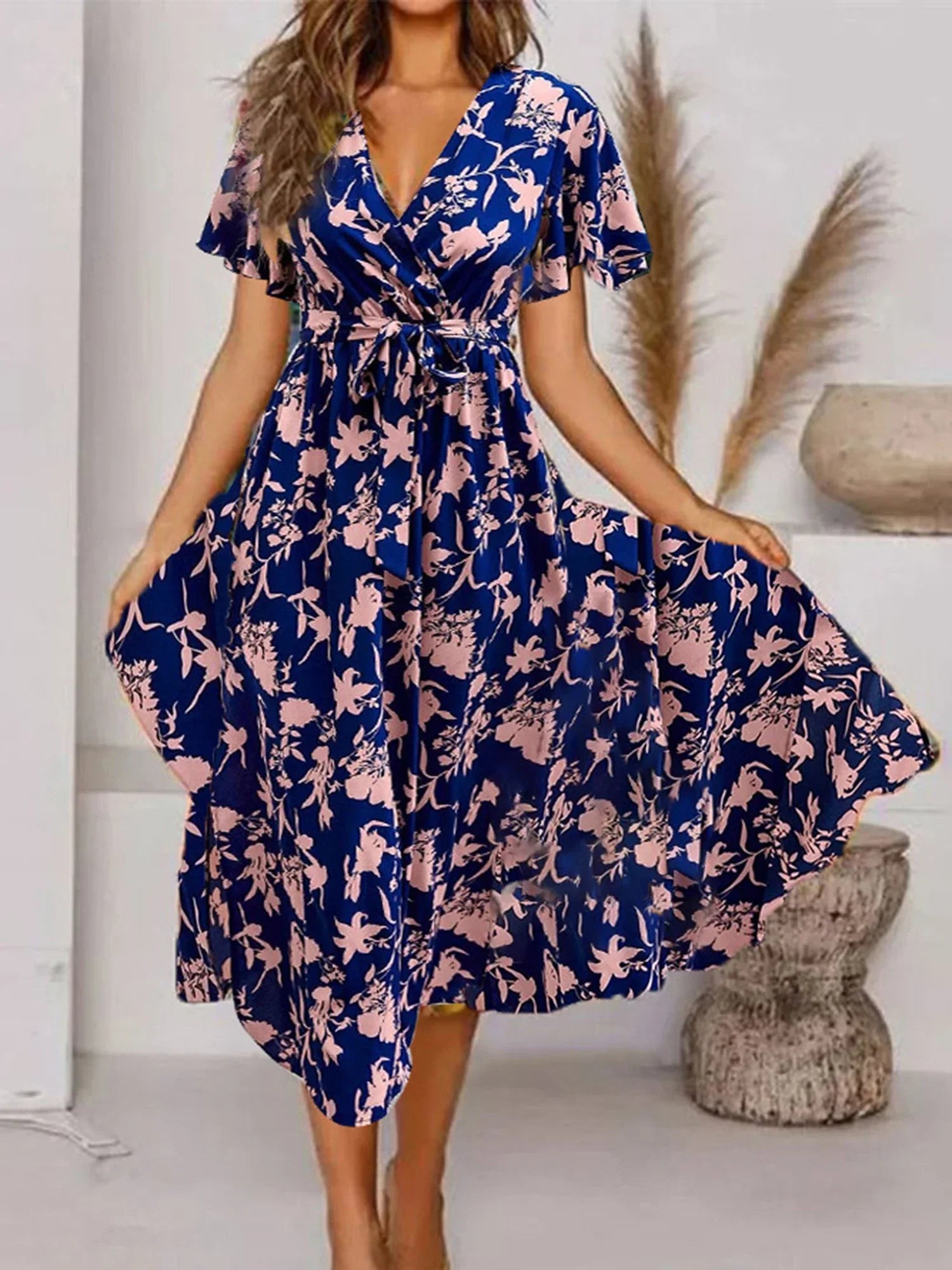 Evy | Rochie midi elegantă cu imprimeu floral rafinat